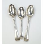A pair of George III silver tablespoons, decorated in the Hanoverian pattern, crest engraved,