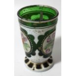 A 19thC Bohemian green glass gilt highlighted and enamel beaker, the bell shaped body decorated with