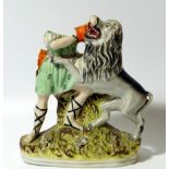 A 19thC Staffordshire figure group, Samson and the Lion, polychrome decorated predominantly in