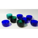 A composite set of late 19thC Bristol blue glass finger bowls, and three green glass bowls.