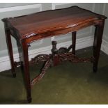 A modern mahogany table in Chippendale style, the shaped top with a raised border, the frieze with