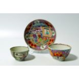 An early 19thC Oriental design tea bowl and saucer, 15cm dia., each polychrome decorated in the