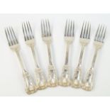 A set of six William IV silver table forks, decorated in the Kings pattern, crest and monogram