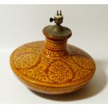 A Victorian slip glazed earthenware lamp base, 40cm dia.