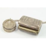 An Edwardian silver sovereign case, Birmingham 1905 on chain, together with a white metal