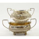 A George III silver twin handled semi-fluted sugar bowl, London 1813, together with a further