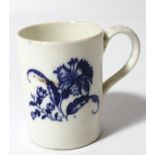 An 18thC English porcelain blue and white cup, the cylindrical body decorated with flowers with a