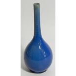 A Chinese porcelain blue crackle vase, the bulbous body with cylindrical stem, in blue with black