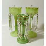 Two pairs of late 19thC green glass lustres, with faceted cut glass drops, 33cm and 27cm high