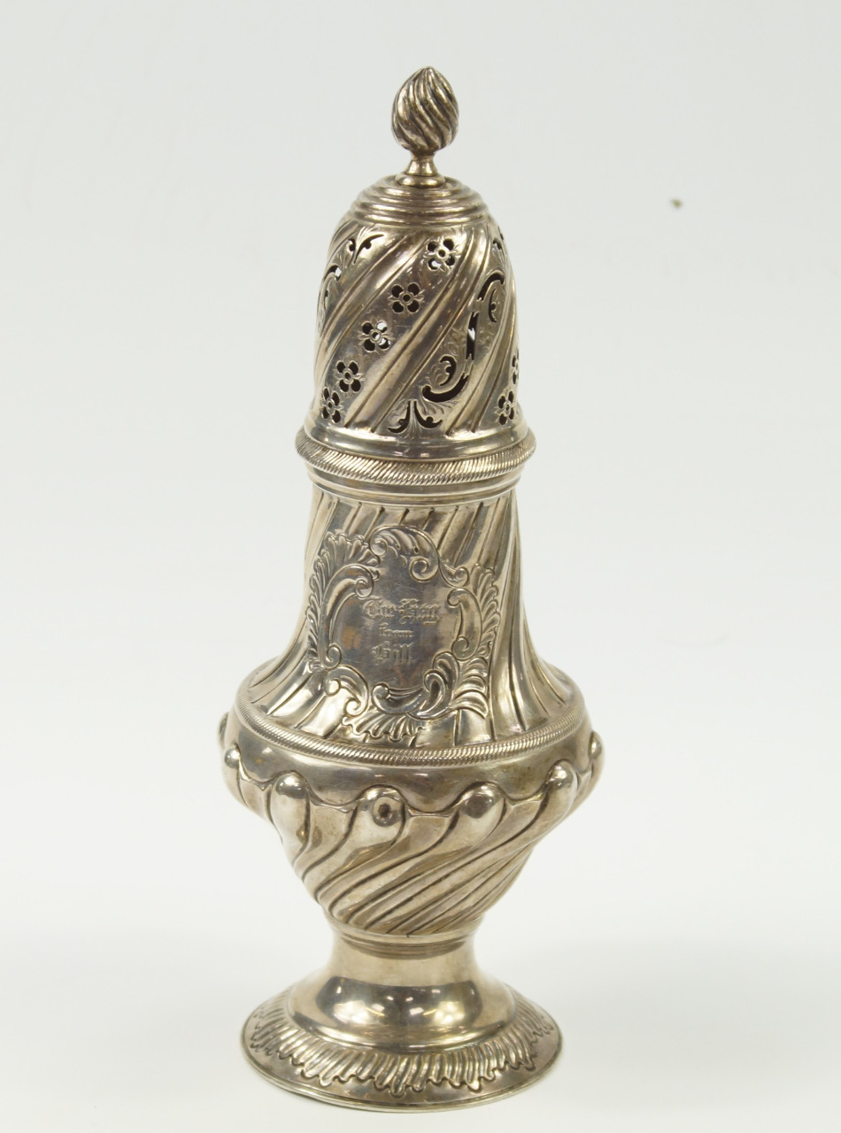 A Victorian silver sugar sifter, of semi fluted baluster form, shield reserve presentation