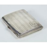 A silver cigarette case, with crest bearing intials W.G.H, Chester, possibly 1926, 3oz. and ashtray.