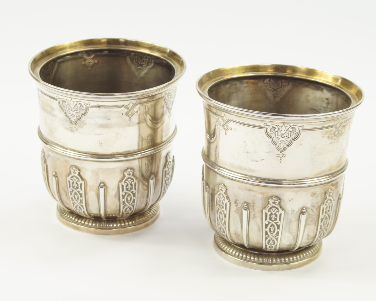 A pair of French white metal candle holders, with fluting and embossed decoration, Bointaburet a