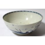 An 18thC Caughley blue and white porcelain punch bowl, the circular body with an inner geometric