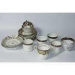 An early 19thC Derby and associated part service, many pieces decorated with an upper blue banding