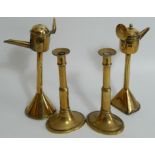 A pair of Victorian formed wall oil lanterns, and a pair of Victorian brass ejector candlesticks