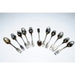 A set of six Victorian silver teaspoons, decorated in the fiddle pattern, monogram engraved, Henry