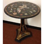 A parcel gilt and ebonised pedestal table, with pietra dura specimen marble top