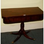 A George IV mahogany tea table, the rectangular top with rounded corners on a turned column and four