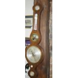 An early 19thC painted rosewood wheel barometer, with swan neck pediment over hygrometer,