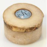 A late 18thC polished Nottingham alabaster patch box, the circular removable lid centred with an