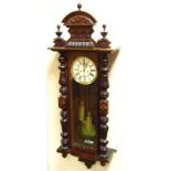 A late 19thC walnut cased Vienna wall clock, by Gustav Becker, the 20cm dia. Roman numeric dial