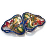 A pair of 20thC Continental Art Nouveau design buckles, each of shaped pierced outline enamelled