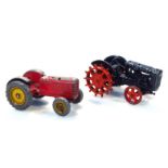 A Britain's metal Fordson major tractor, in blue with red spiked and plain wheels, 6cm high, and a