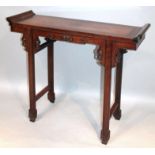 A Chinese hongmu and burr wood alter table, the rectangular top with scroll ends above a part