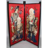 A probably early 20thC two fold screen, decorated with raised embroidered panels of a sage and