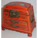 A 20thC oriental Japanese style faux lacquer casket, the domed top heavily decorated with birds