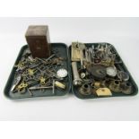 A carriage clock outer casing together with locks, keys, corkscrews, lobster picks, scissors and