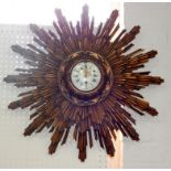 A French giltwood starburst wall clock, enamel dial painted with Roman and Arabic numerals, 60cm