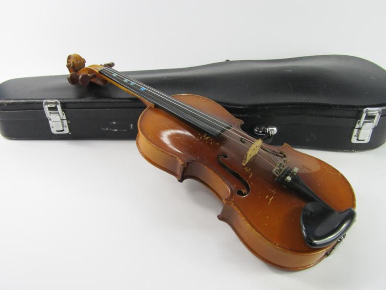 A Chinese Lark violin with bow, cased.