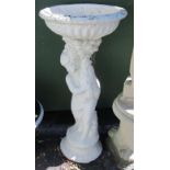 A reconstituted bird bath, on a putto and fish support and circular base, 101cm high.