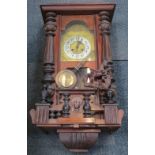 A Continental late 19thC mahogany cased wall clock, brass dial embossed with flowers, silvered