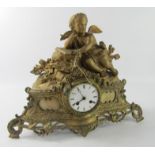 A Leroy a Paris gilt spelter mantel clock, enamel dial bearing Roman numerals, eight day movement