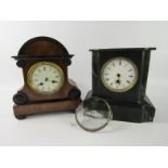 A Victorian walnut and ebonised mantel clock, of architectural form, white enamel dial bearing Roman