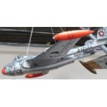 A polystyrene Jet type remote controlled airplane, with Swiss Insigna and marked J-1753, 120cm