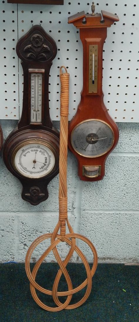 An early 20thC oak cased two dial barometer, 57cm high, in onion topped case, another modern