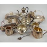 A large quantity of silver plate, to include a four piece tea set, a pair of entree dishes, etc.