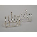 A pair of George V four division small toast racks, each of circular form, with bun feet, Birmingham