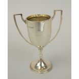 A late Victorian silver two handled cup, with tapering beaded base, Birmingham 1894, 2oz, 11cm
