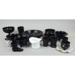 A large quantity of Victorian press moulded glass, to include cauldrons, a top hat shaped vase,