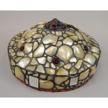 A late 19thC-early 20thC Tiffany style ceiling light, decorated with shells, glass roundels and