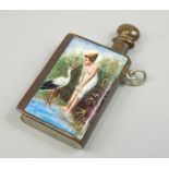 A Continental silver plated lighter, decorated with enamel scene of a lady with a stork, 5cm high.