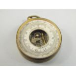 An early 20thC pocket barometer by J J Wainwright & Co, the 4cm diameter dial with outer Arabic