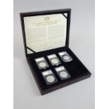 A part set of silver dollars, cased.