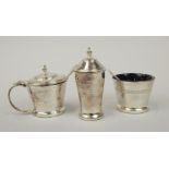 A silver plated Art Deco style three piece cruet, comprising salt, mustard pot, pepper pot, made