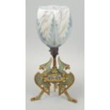 An early 20thC French Egyptian Revival lamp base, with an opaque painted shade, plain column, the