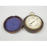 A 20thC pocket barometer, the 4cm dial marked Rain, Change, Fair, Stormy and Very Dry, with an